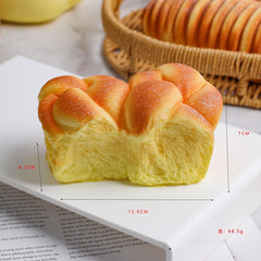 Juguete sensorial blando de pan de crecimiento lento con un aplastamiento súper suave y premium para aliviar el estrés.