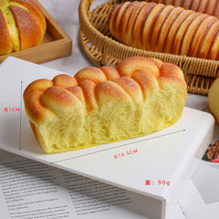 Juguete sensorial blando de pan de crecimiento lento con un aplastamiento súper suave y premium para aliviar el estrés.