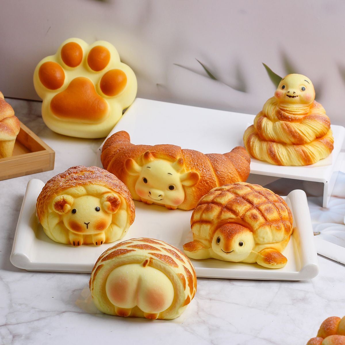 Juguete sensorial blando de crecimiento lento Butt Bread con un aplastamiento súper suave y premium para aliviar el estrés.